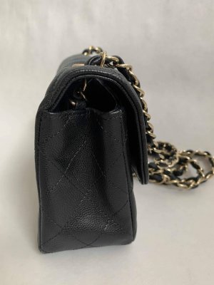 Chanel Classic mini 8” Black Caviar Leather and Light Gold Champagne Hardware.