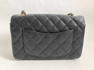 Chanel Classic mini 8” Black Caviar Leather and Light Gold Champagne Hardware.