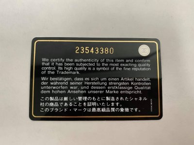 Chanel Classic mini 8” Black Caviar Leather and Light Gold Champagne Hardware.