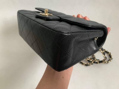 Chanel Classic mini 8” Black Caviar Leather and Light Gold Champagne Hardware.