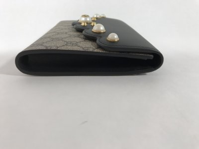 Gucci Supreme Pearl Clutch