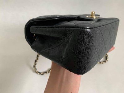 Chanel Classic mini 8” Black Caviar Leather and Light Gold Champagne Hardware.