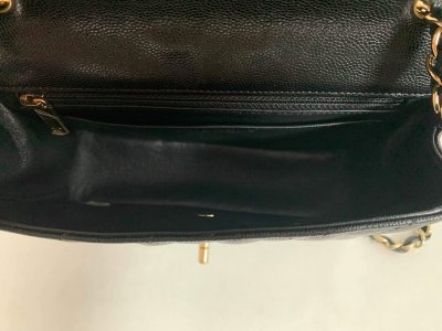 Chanel Classic mini 8” Black Caviar Leather and Light Gold Champagne Hardware.