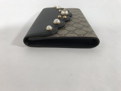 Gucci Supreme Pearl Clutch